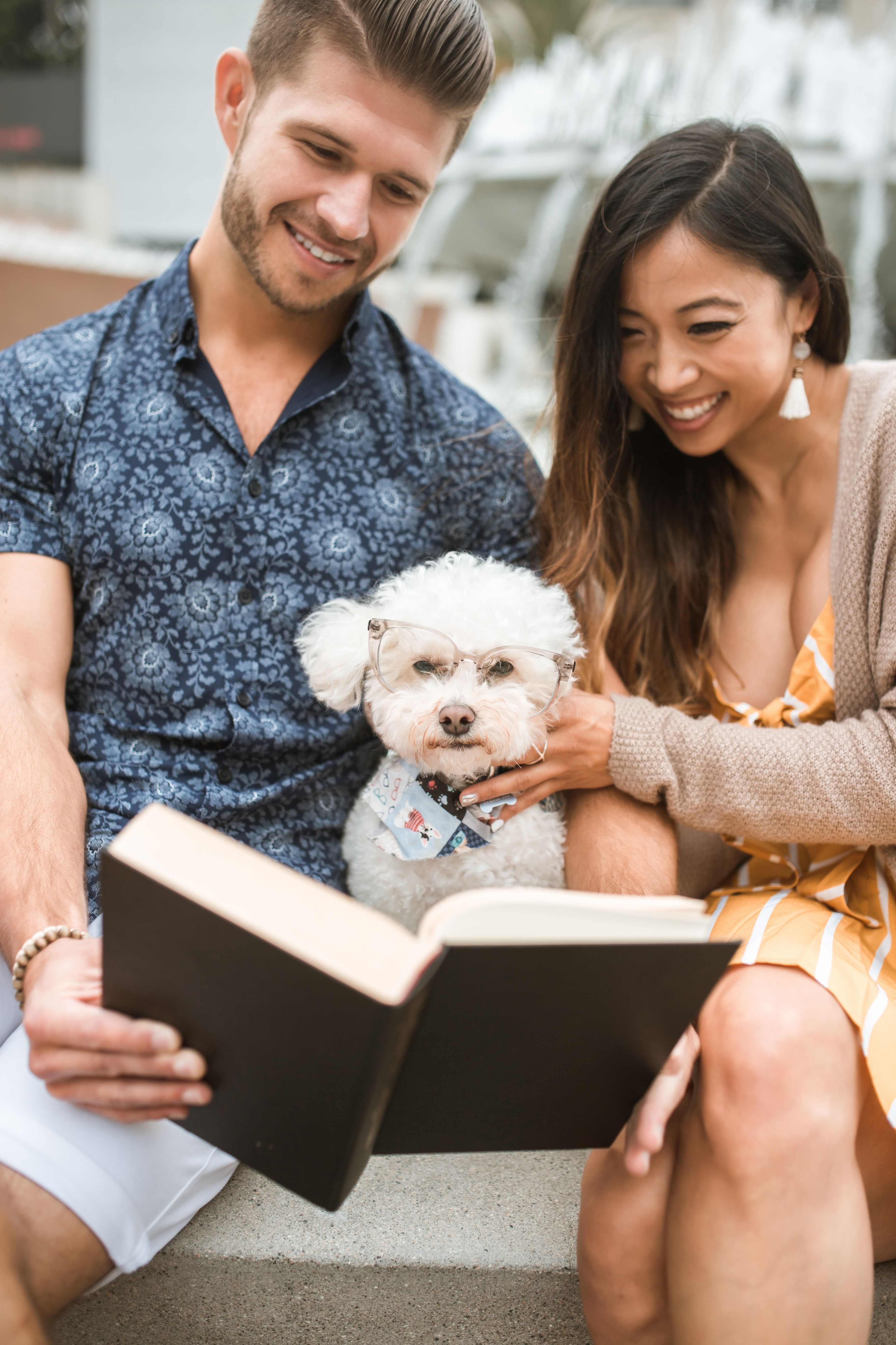 Neighbors sharing books at a little library
